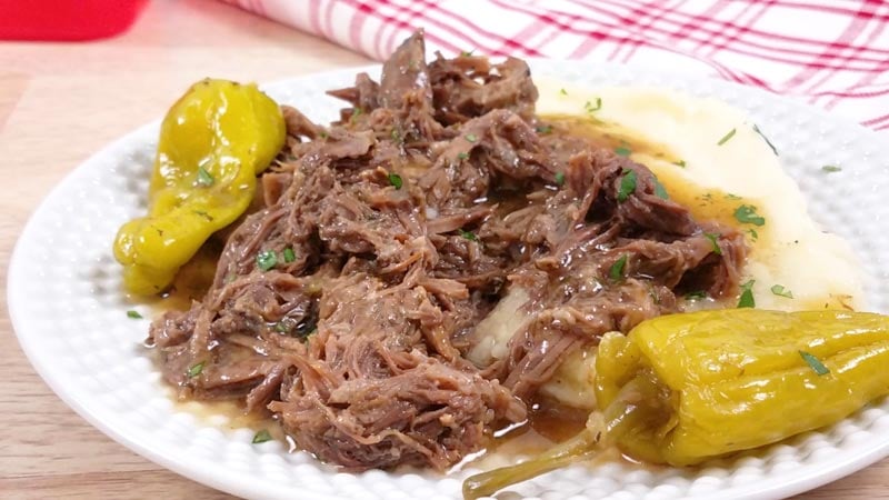 mississippi pot roast with pepperoncinis on a white plate