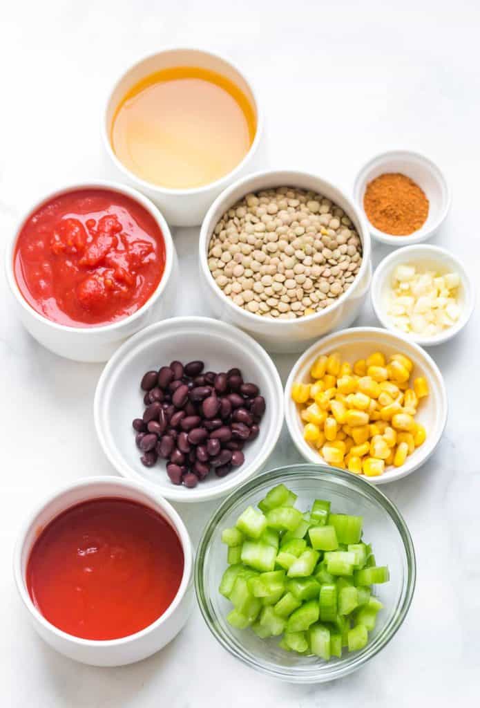 ingredients for lentil tacos in white bowls