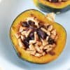 baked sweet acorn squash on a white plate
