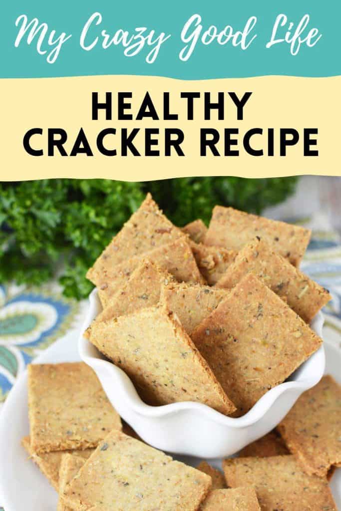 Image of baked gluten free crackers in white bowl. 