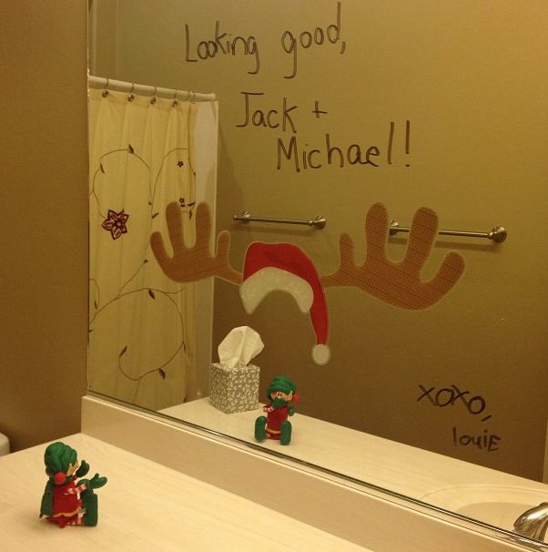 Elf on the Shelf with Window Clings on Mirror