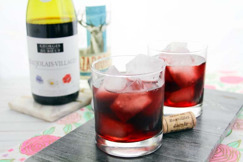This Red Wine Margarita recipe is so easy! You'll impress your friends with this Sangria style cocktail. Tequila, red wine, and triple sec make up this happy hour cocktail. Margarita Recipe | Margarita Cocktail | Red Wine Cocktail | Red Wine Recipe #wine #margarita #cocktail