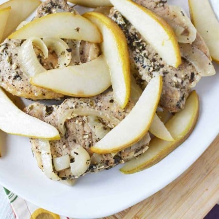 Easy Crockpot Pork Chops with Pears on white plate