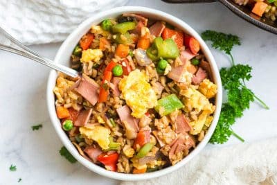 Bowl of breakfast fried rice in white bowl