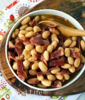 These homemade pork and beans are the perfect summer side dish. They're healthier than traditional canned pork and beans, too! Turkey bacon and honey are the magic ingredients in this delicious backyard BBQ recipe.