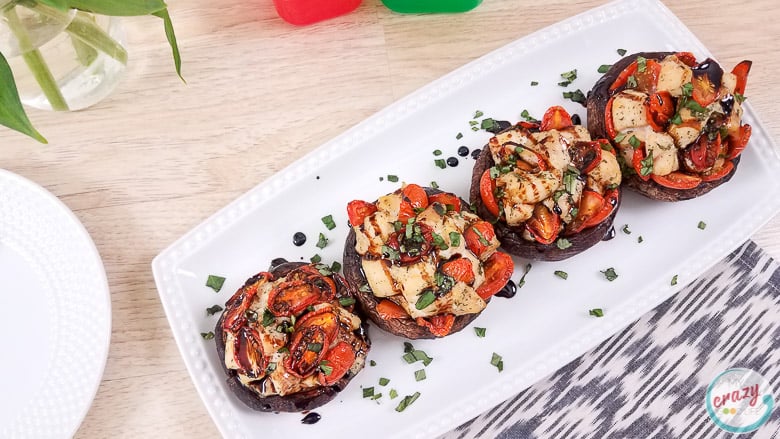 These Caprese Chicken Stuffed Portobello Mushrooms are a delicious lunch or dinner! A large portobello mushroom topped with a caprese chicken inspired mixture can be easily baked for a healthy dinner. I love how hearty and versatile portobello mushrooms are! Stuffed Portobello Mushroom Recipes | Mushroom Recipes | Portobello Recipes