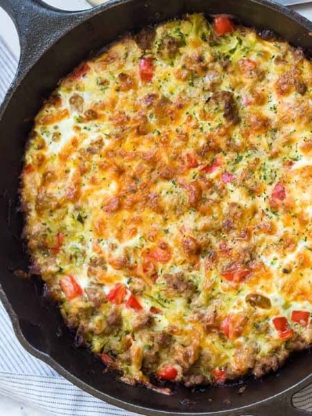 zucchini sausage casserole in a cast iron skillet