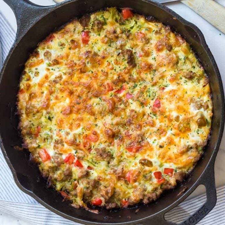 zucchini sausage casserole in a cast iron skillet
