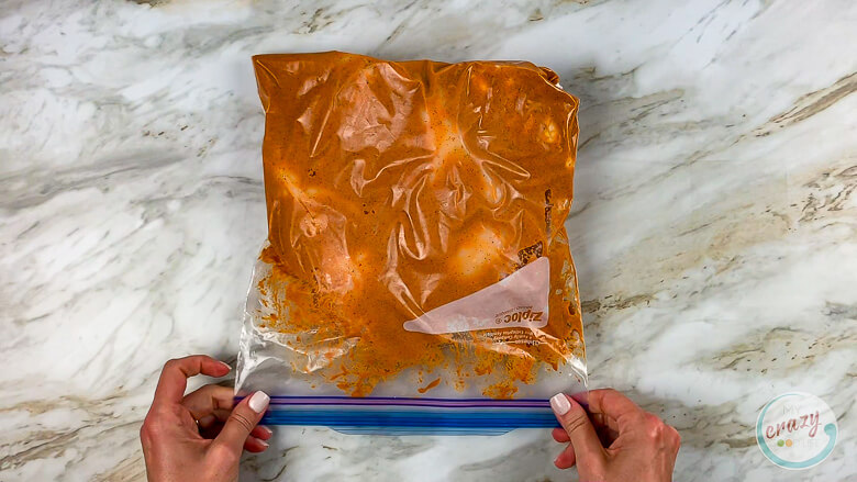 zipper bag of marinade and chicken