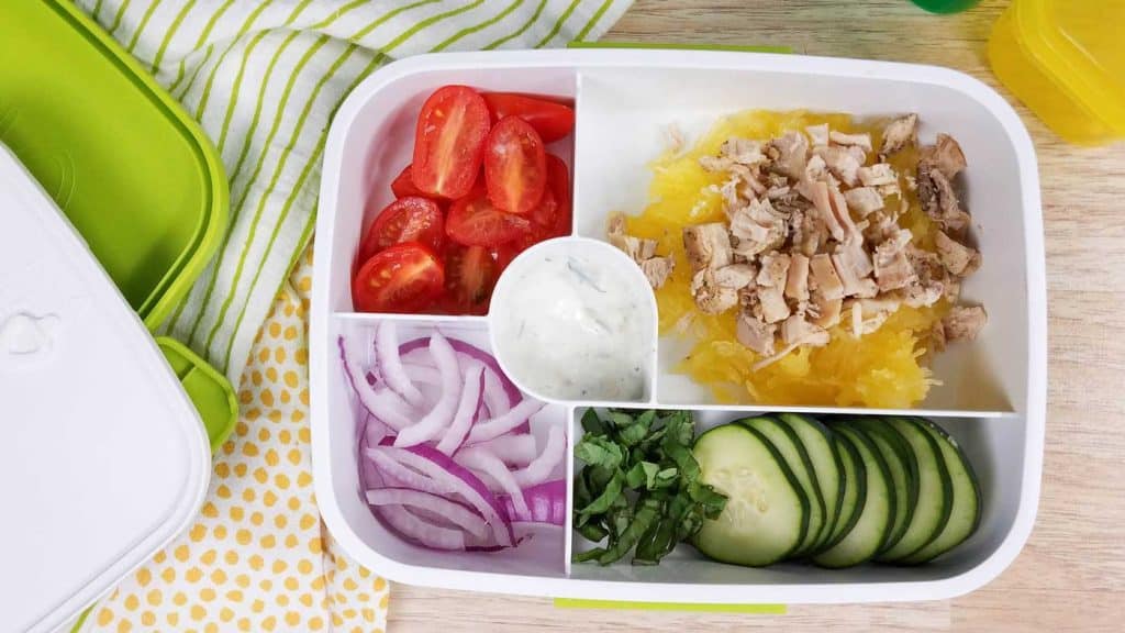 meal prep chicken gyro bowls in separated container for lunch