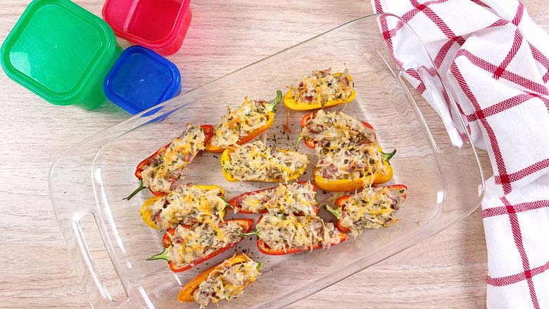 glass baking dish with mini peppers filled with crack chicken dip