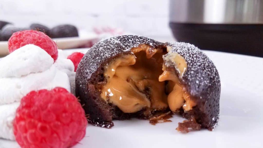 open peanut butter lava cake with peanut butter melting out