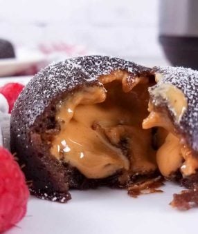 open peanut butter lava cake with peanut butter melting out