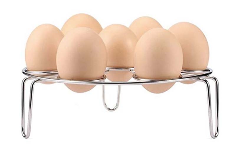 metal egg rack with eggs in it.