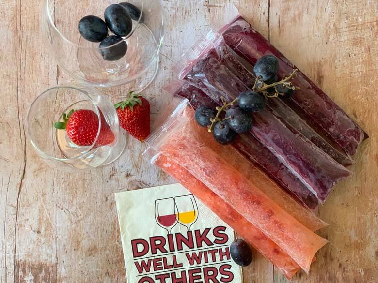 wine popsicles on a wood background