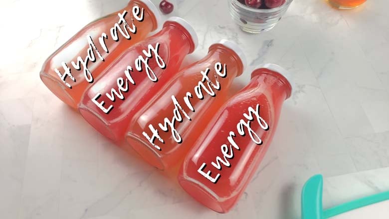 electrolyte and vitality drinks lying on a counter  Cherry Lime Homemade Electrolyte Drink electrolyte drinks 006