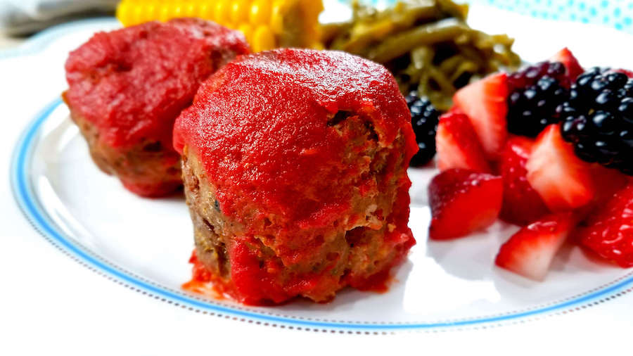Meatloaf bites ready to eat with veggies.