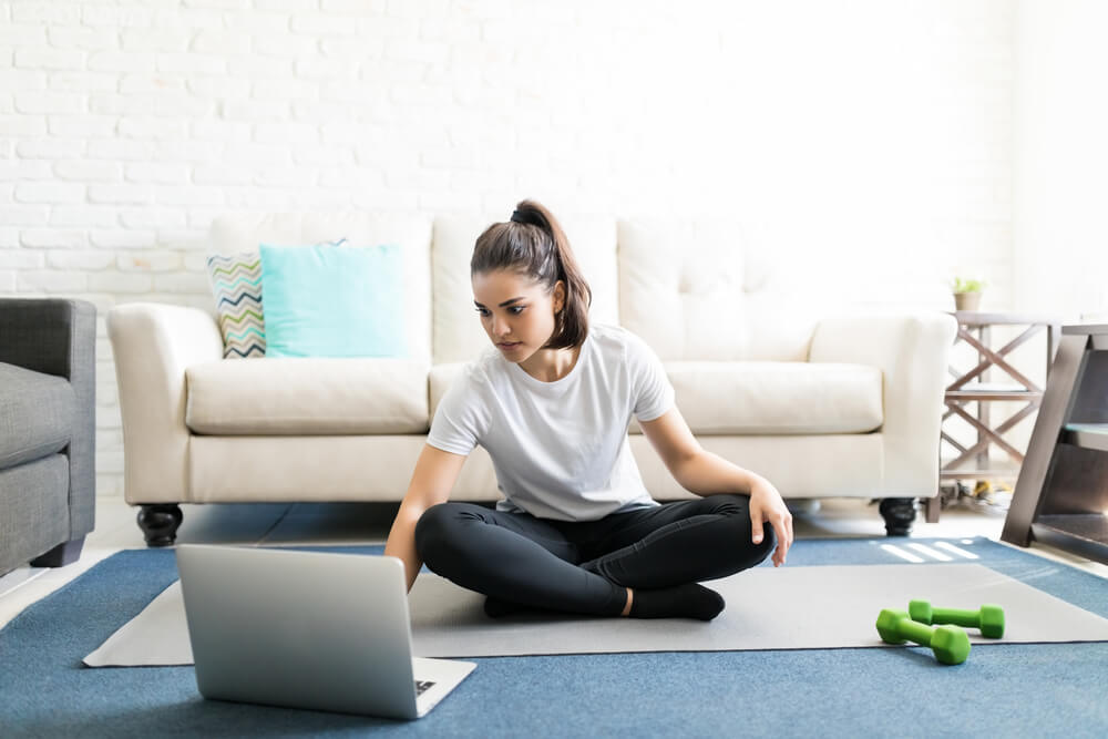 woman getting ready to workout at home.