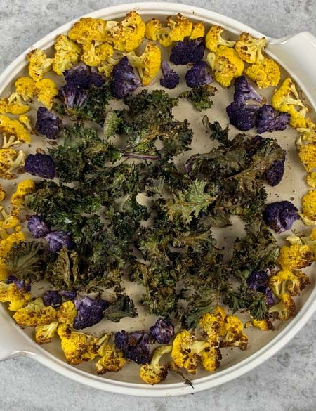 roasted cauliflower and kale on stone