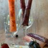 wine glasses with wine popsicles sitting inside.