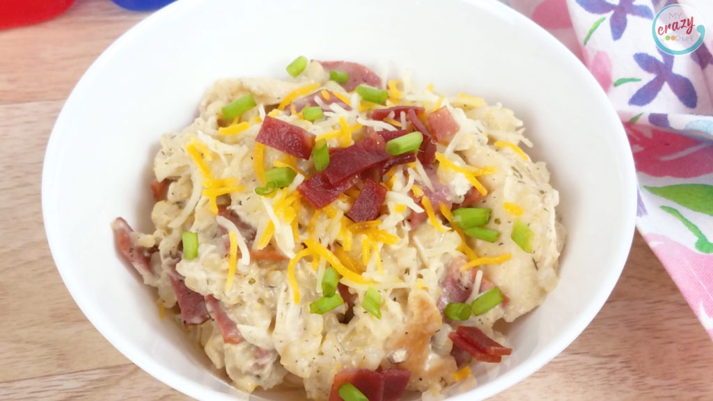 Casserole in white bowl with bacon