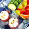 starbucks egg white bites in a meal prep container with fruit and veggies