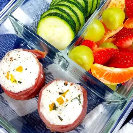 starbucks egg white bites in a meal prep container with fruit and veggies
