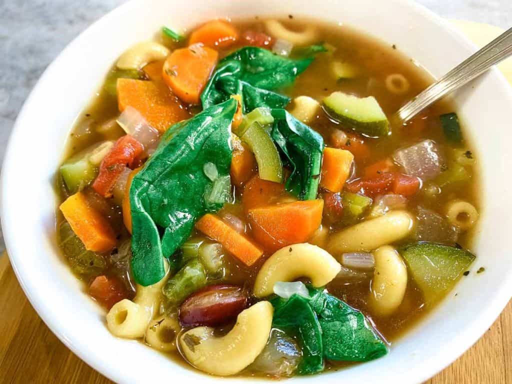 Vegan Minestrone Soup close up on spoon