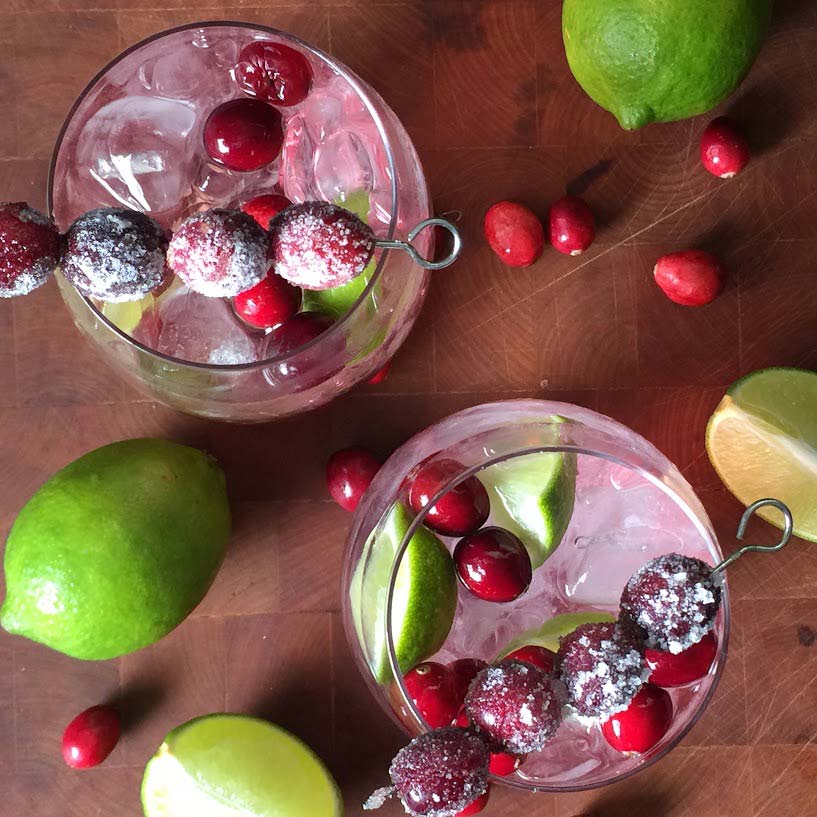 two cranberry margaritas top down view