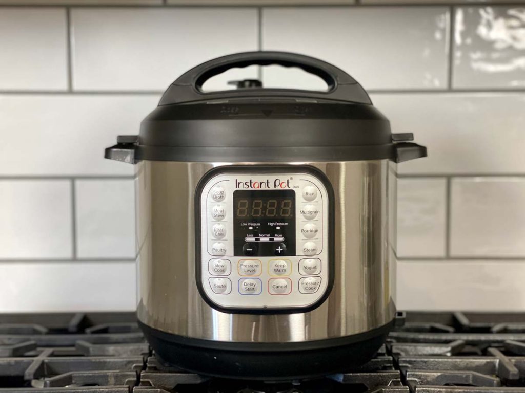 instant pot sitting on top of stove top