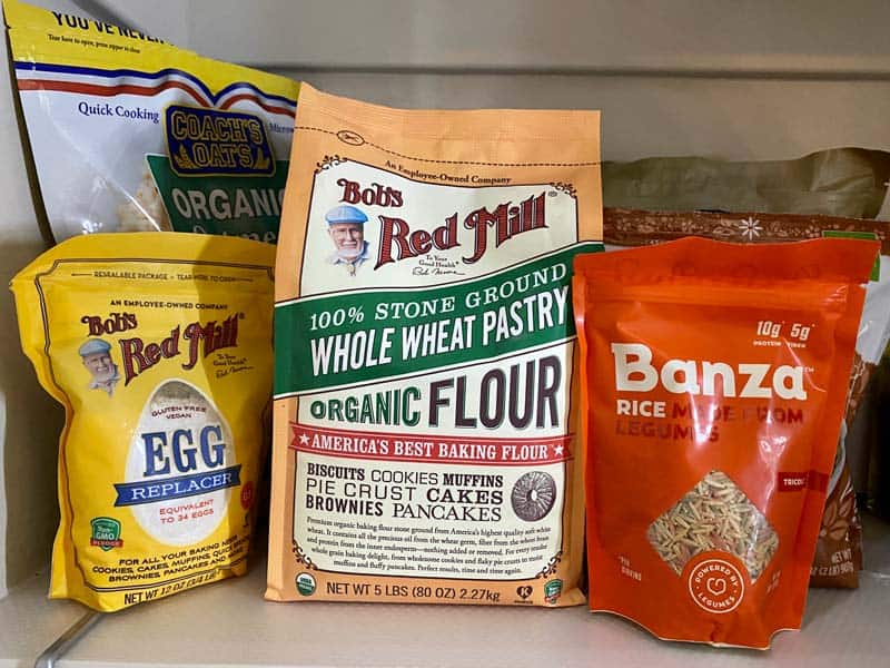 healthy pantry items: wheat flour, chickpea pasta, egg replacer