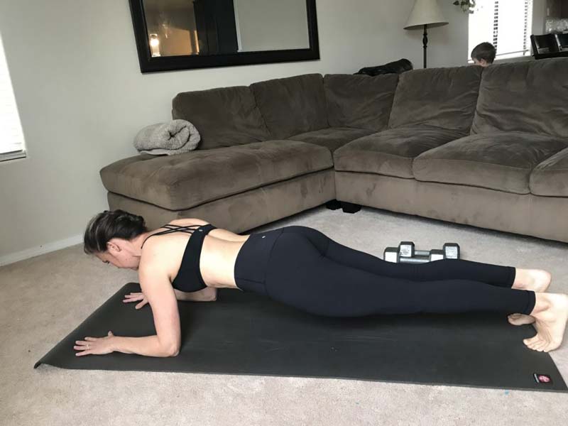 image of girl performing plank on elbows