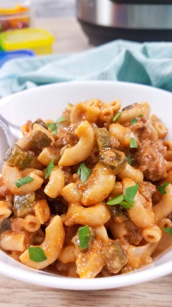 green chili hamburger helper in a white bowl