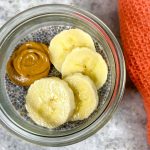 top down view of chia pudding with peanut butter and bananas