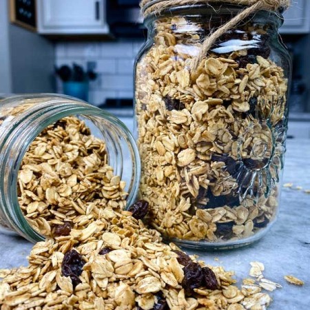 canning jar spilliing out healthy homemade granola