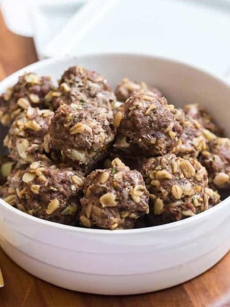 White bowl with homemade instant pot meatballs.