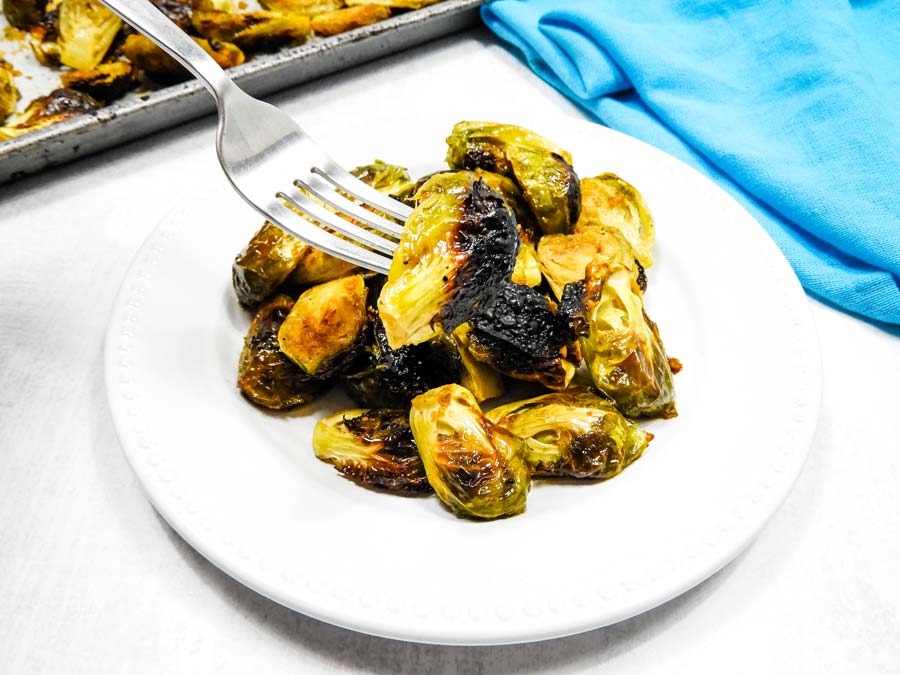 teriyaki brussels sprouts on a fork