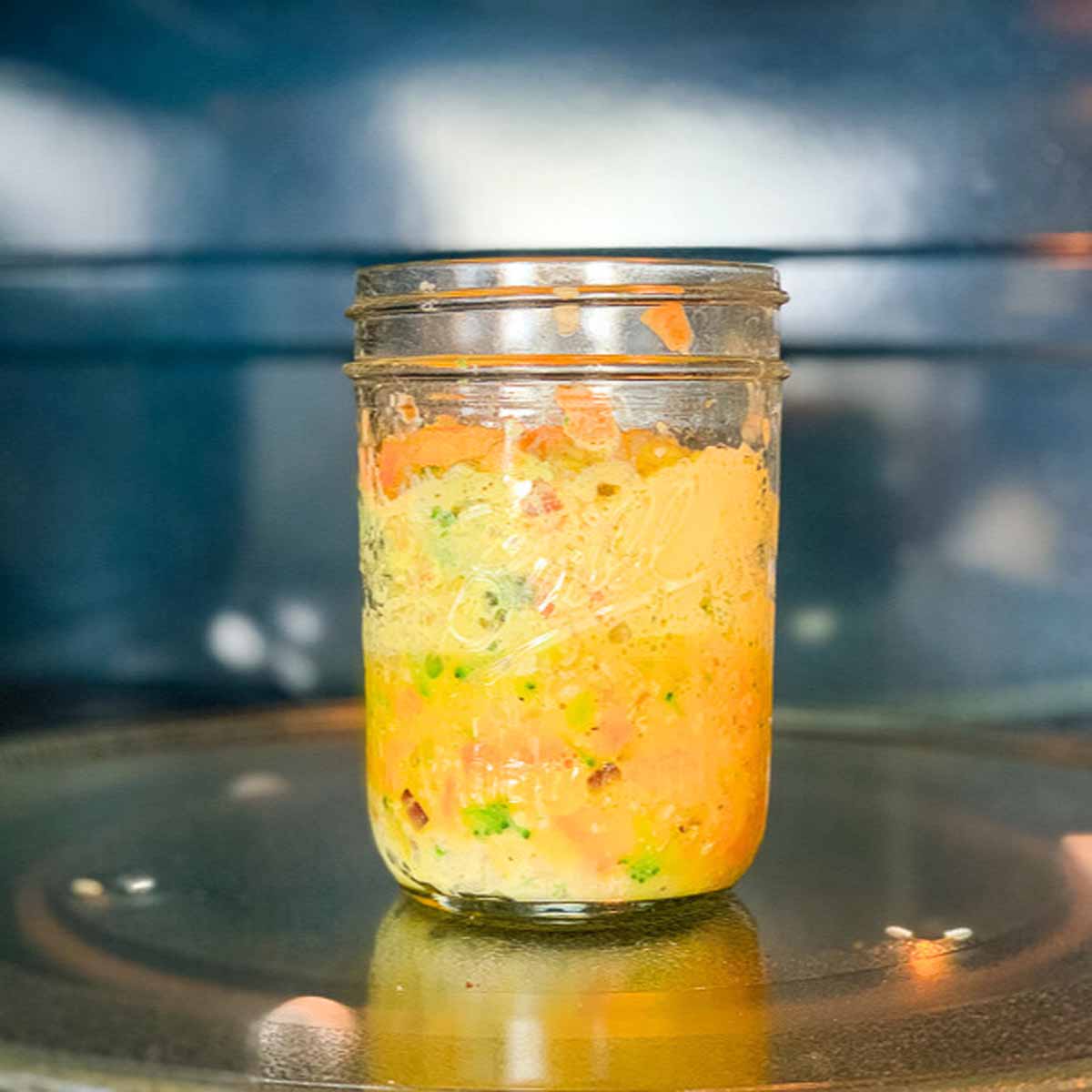 Homemade Just Crack an Egg cup inside the microwave.