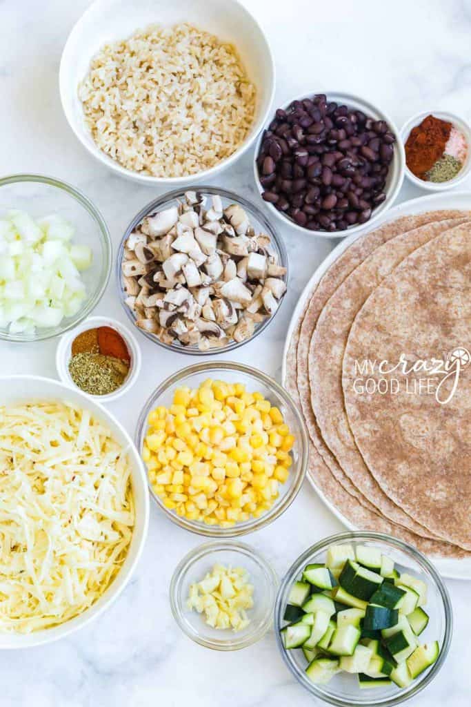 ingredients needed for healthy veggie quesadillas on white counter