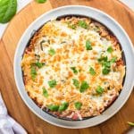 image of weight watchers lasagna on a circular wooden board