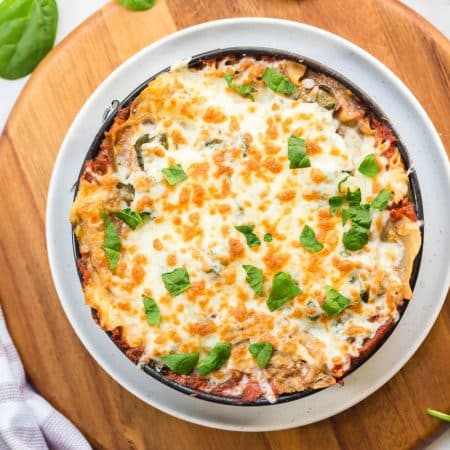 image of weight watchers lasagna on a circular wooden board