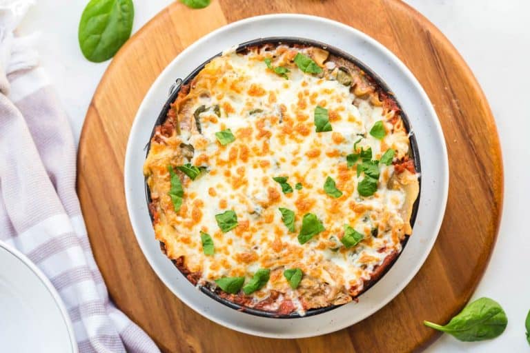 image of weight watchers lasagna on a circular wooden board