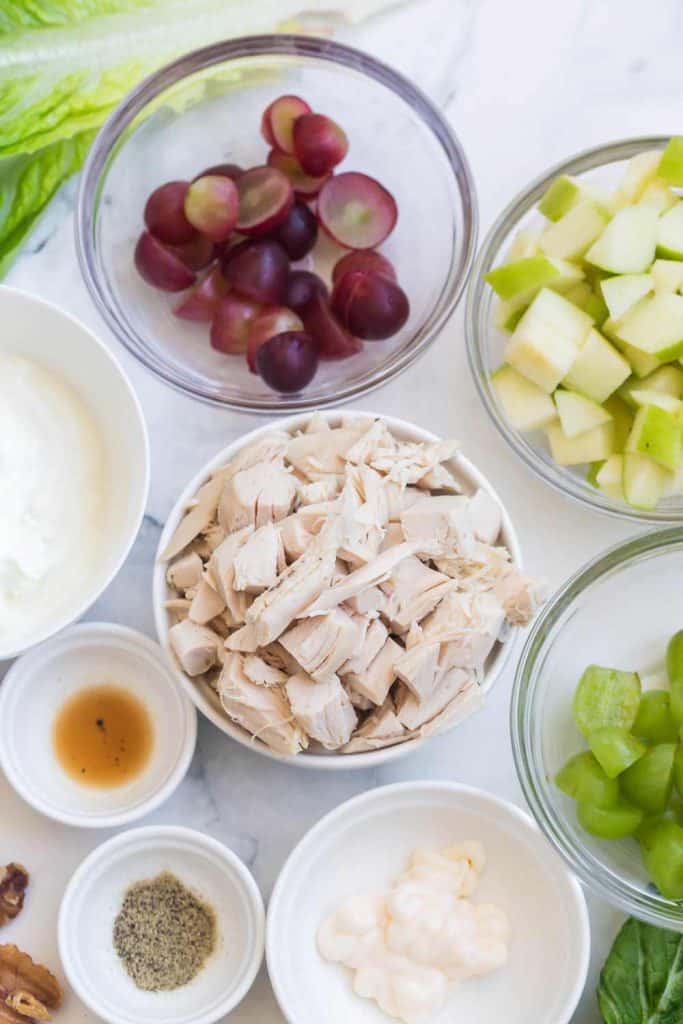 ingredients for this chicken salad in small glass bowls