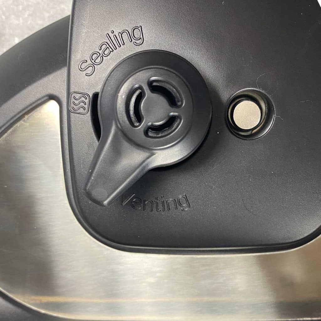 The pressure Release Valve on an Instant Pot set to Venting. 