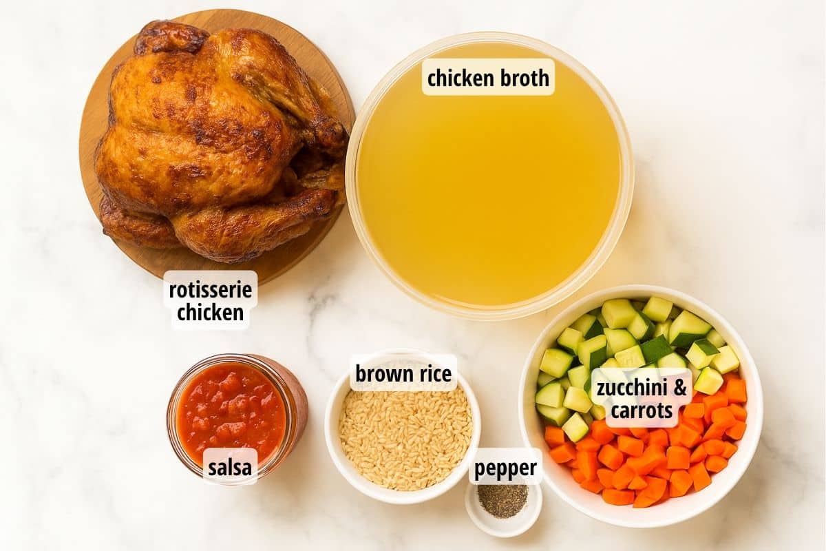 A white counter top with labeled ingredients to make rotisserie chicken soup.