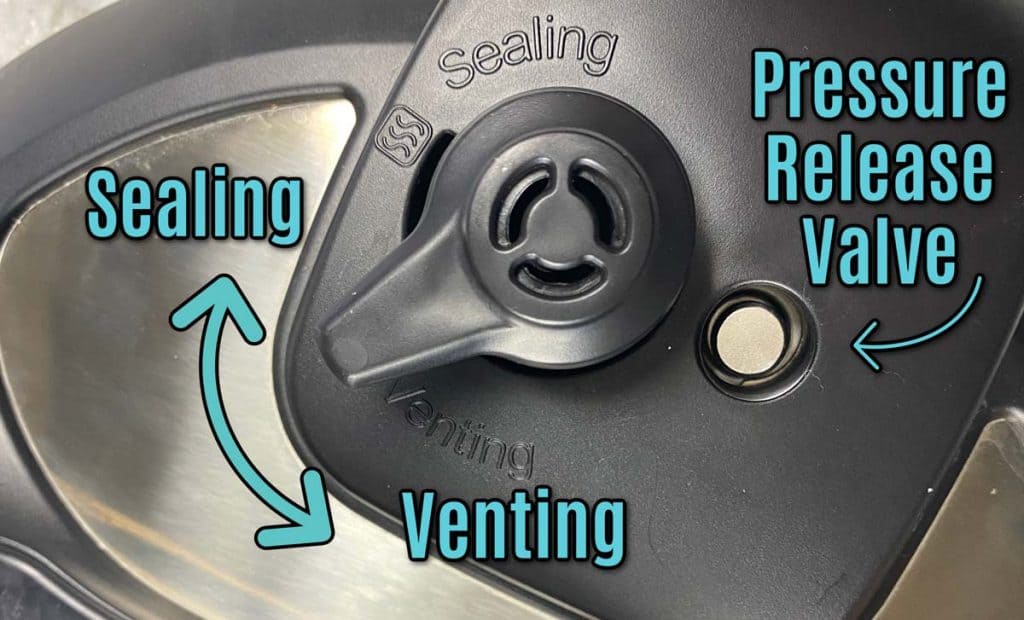 close up of the Instant Pot sealing Knob and Pressure Release Valve. Sealing and Venting positions are labeled in teal text, as is the Pressure Release Valve. 