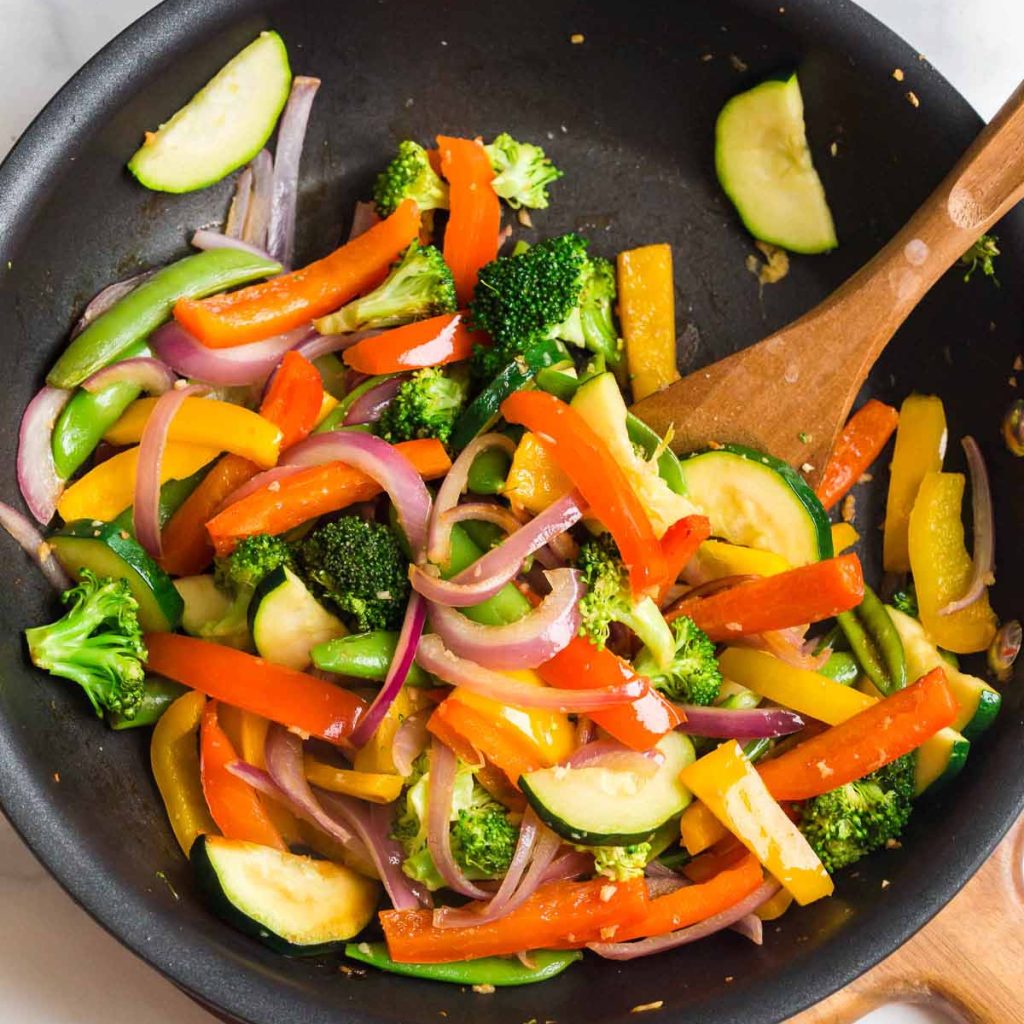 pan of stir fry veggies that are cooked and lightly softened