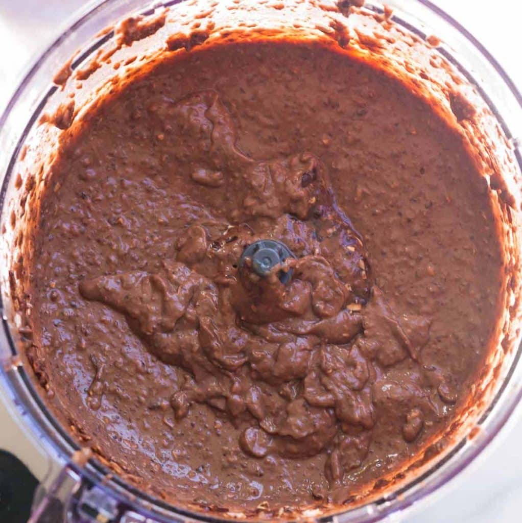 food processor with black bean and brownie mix blended together