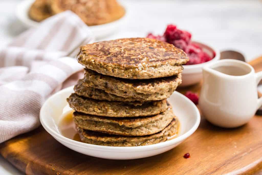 stack of Vegan Whole Wheat Pancakes on a white plate