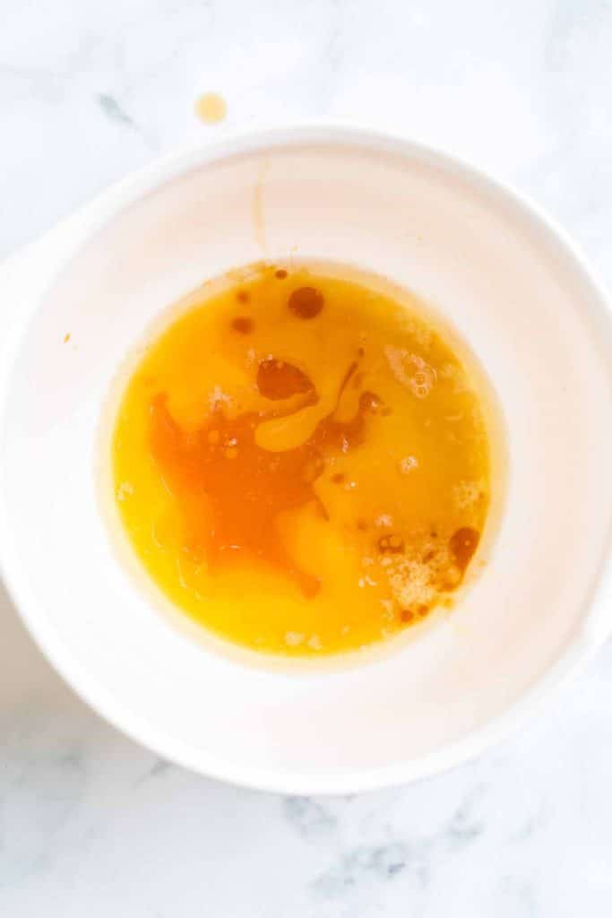 white bowl with melted butter and vanilla